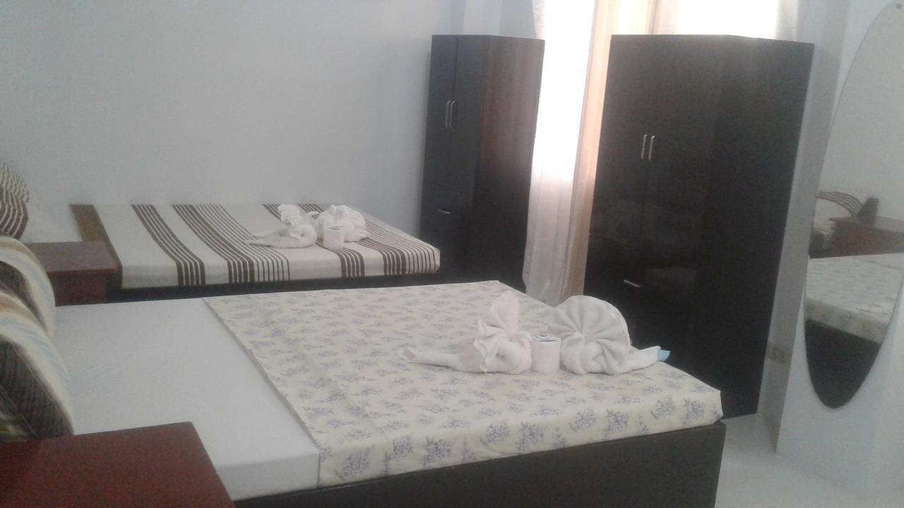 Chelle'S Apartelle - Inn El Nido Ngoại thất bức ảnh
